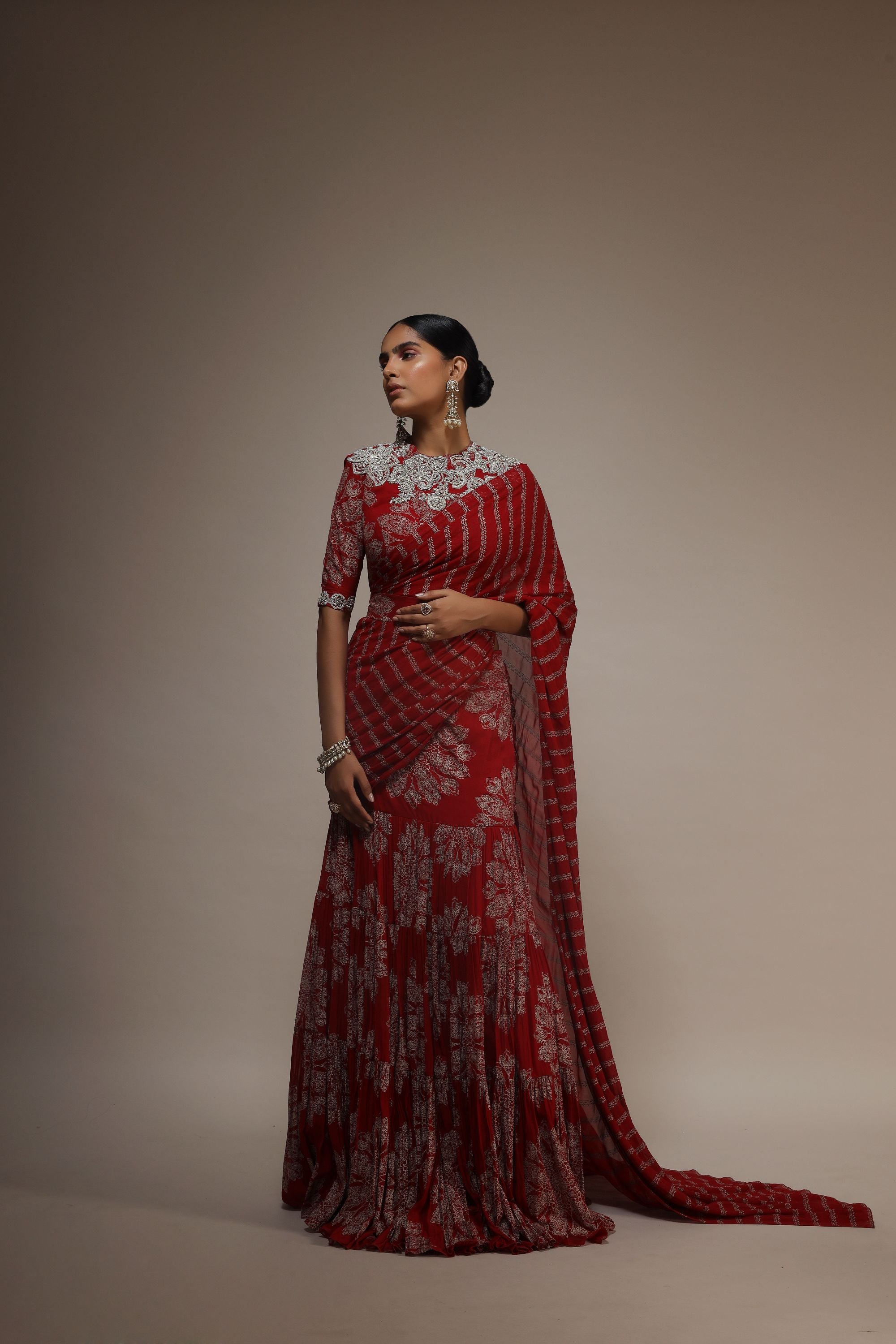 Siddhi Arora - Burgundy draped lehenga saree... | Facebook
